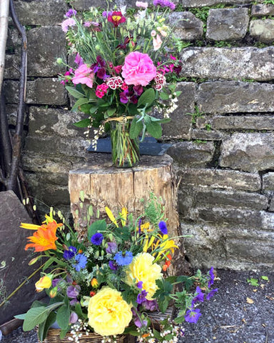 Glass jar full of fragrance : roses, cornflowers, geranium, deutzia, sweet peas, grasses, alstroemeria, ammi