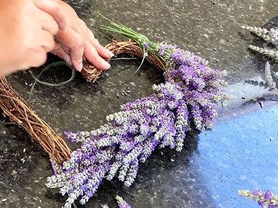 heart-shaped wreath tying on lavender