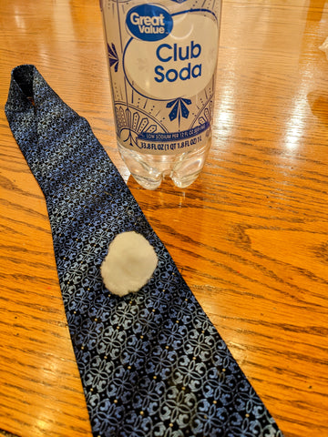 Tie with cotton ball and club soda