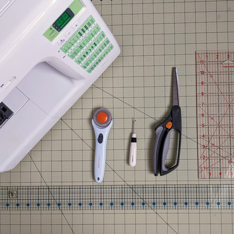 Sewing machine, rotary cutter, seam ripper, scissors, rulers