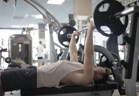 man training with weights