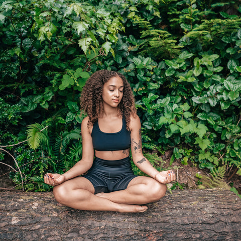 A woman practicing yoga 