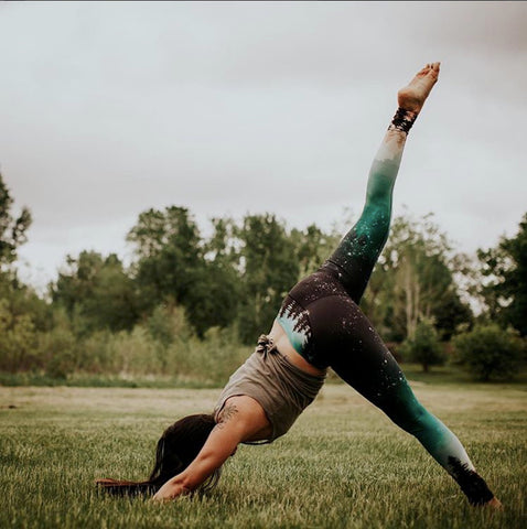 woman doing yoga in Into the Woods leggings