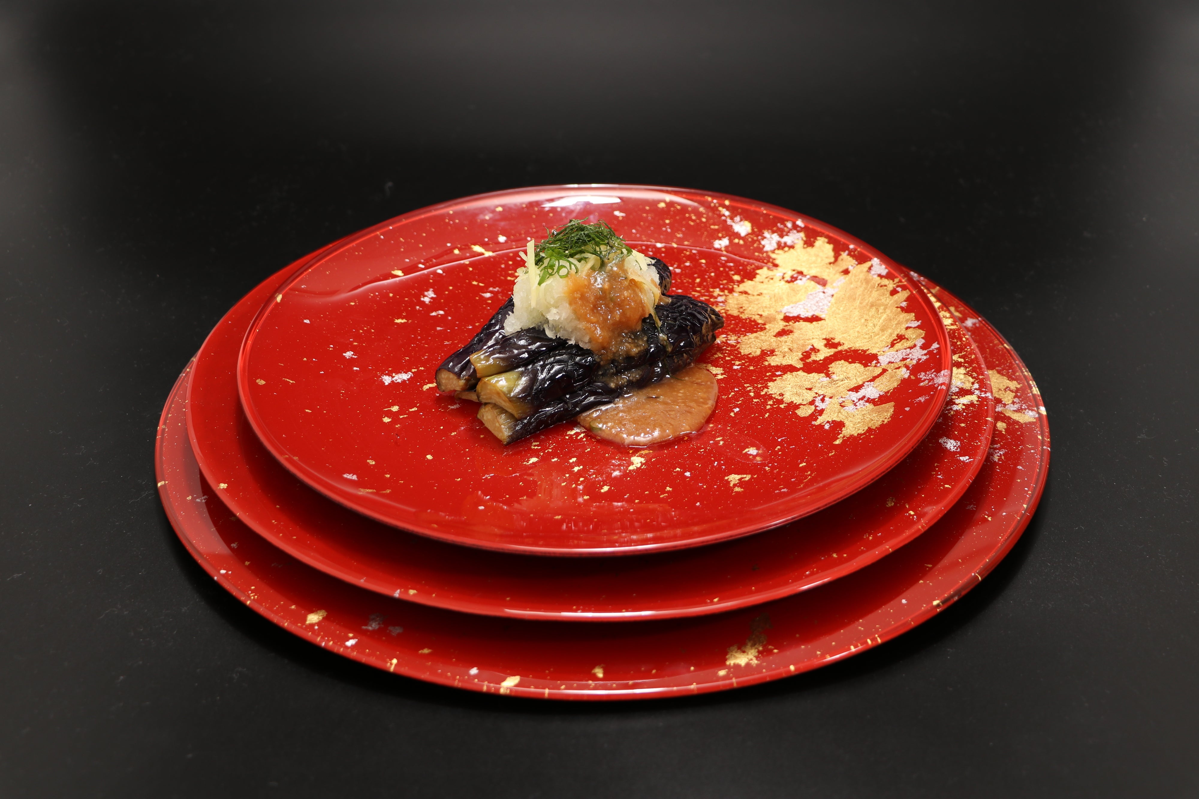 Grilled Japanese Eggplant with Miso Sauce on Syosaku Urushi Glass Flat Dinner Plate Vermilion with Gold Leaf, Dishwasher Safe.