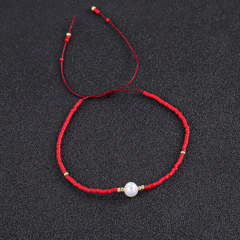 bracciale-rosso-portafortuna-con-perla