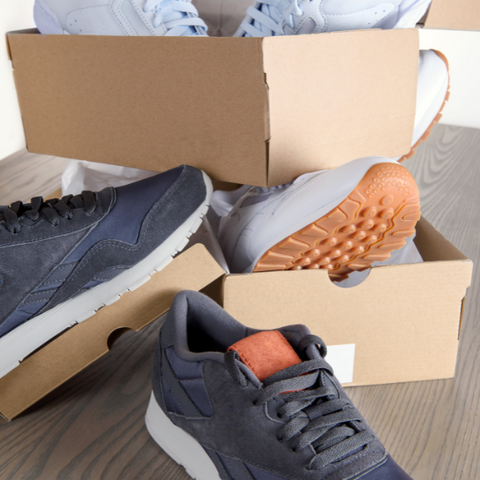 Running trainers in shoe boxes