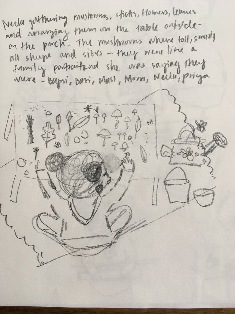 Messy pencil sketch and story notes. The sketch is of a child sitting on the floor from the back. There is a table in front of them and they are arranging leaves, mushrooms, and flowers.