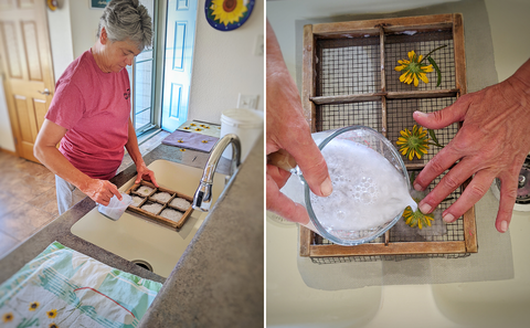 Denise pouring pulp into her paper moulds.