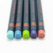The set includes pens in cerulean blue, indigo, yellow-green, navy blue, and brown.