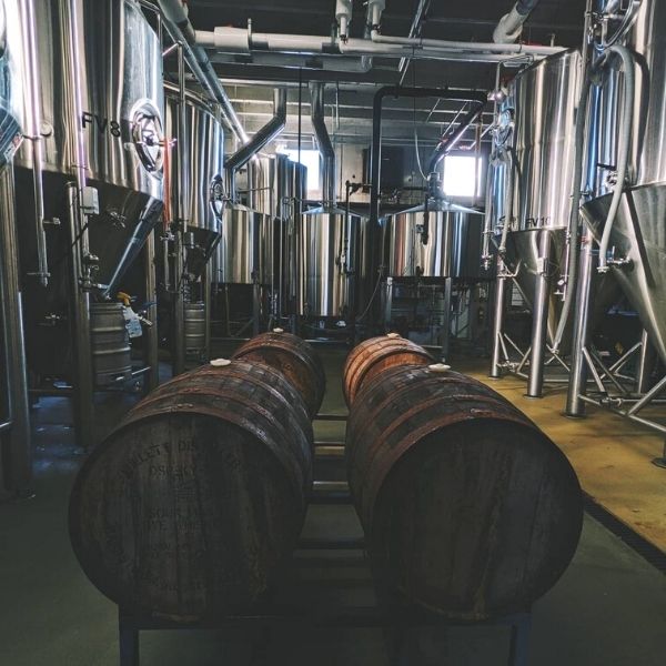 Willett Distillery barrels aging beer in a brewery