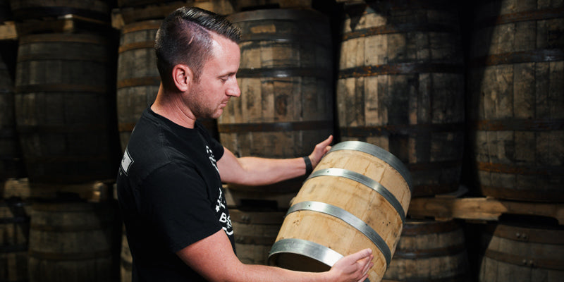 Barrel Ben inspects a new 5 gallon barrel.