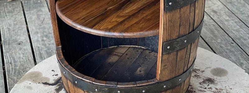 Whiskey barrel that's been converted into a container with door and shelving inside