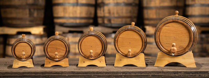 Different sizes of oak aging barrels