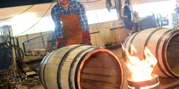 Coopers charring oak barrels