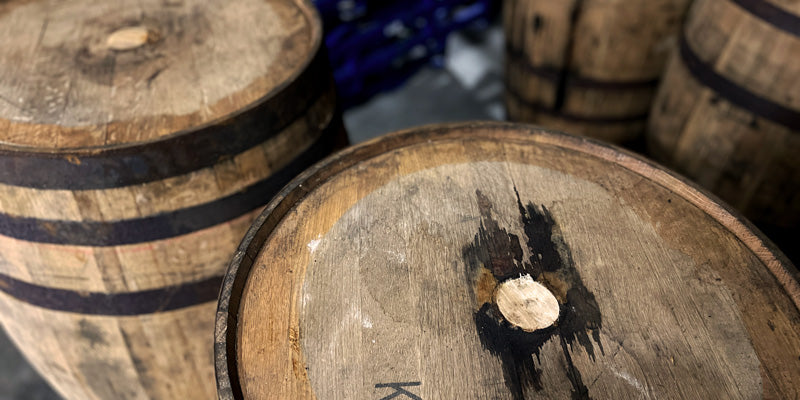 Used whiskey barrels with head bungs