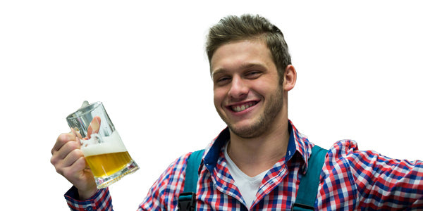 Smiling homebrewer holding a mug of beer