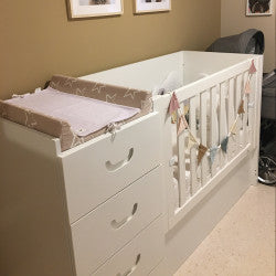 Children's room with small convertible crib