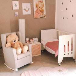 Baby room with cot and nursing chair