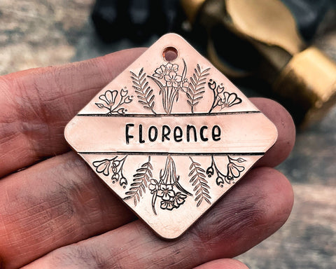 square dog id tag hand-stamped with flower design