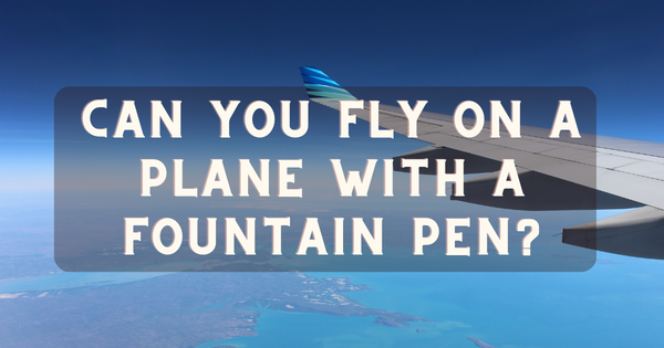 fountain pen on plane