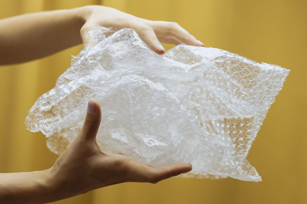 Person holding bubble wrap