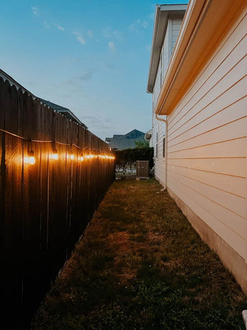 fence lighting with festoon lights