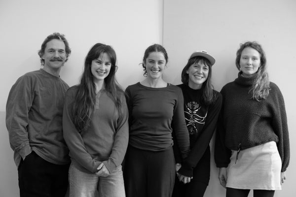 the wolf ceramics team standing in front of a white wall