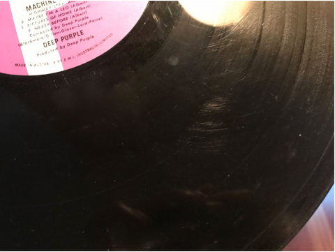Scuffs on a vinyl record