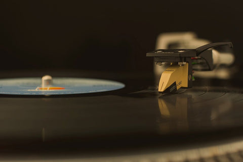 Stylus playing on a vinyl record