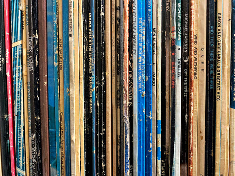 A stack of vinyl record albums