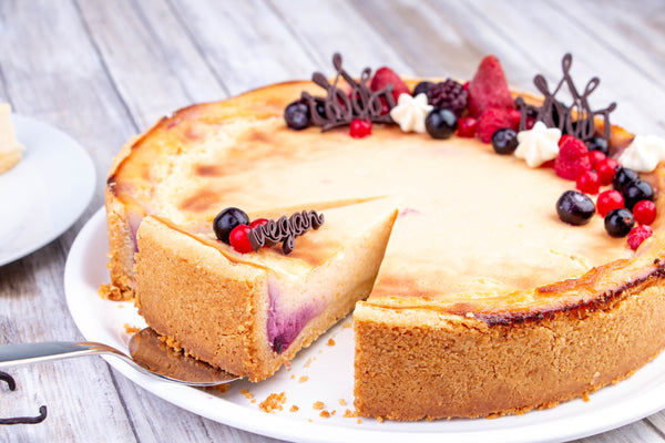 Veganer Käsekuchen mit Kuchentopping aus Schoko erstellt mit dem mycusini