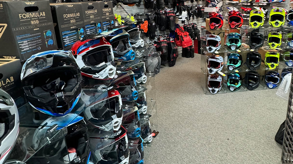 motorcycle helmets on display at Sprocketz