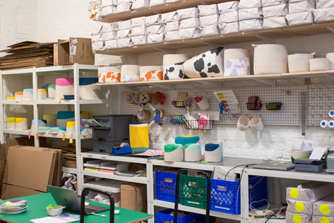 The Closed Mondays studio: a countertop filled with baskets waiting to be shipped.