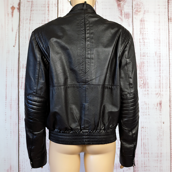 Vintage 1980s black leather biker style zip up jacket | 80s Michael Jackson style | Belted snap collar and sleeves | Made in Canada | Large