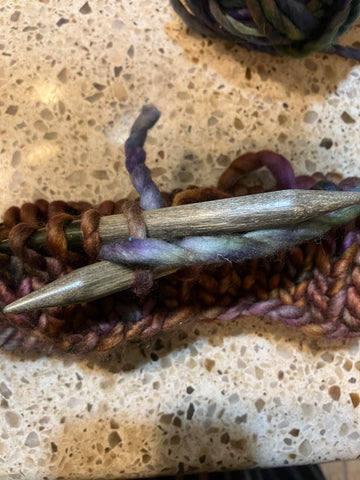 Adding a new strand of yarn to a knitting project