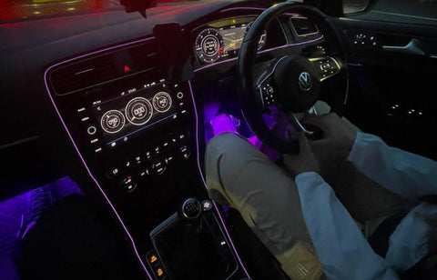 Car interior purple lights in VW Golf.