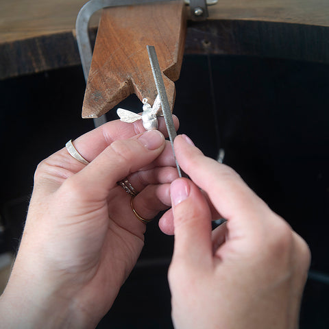 Claire Troughton making a silver bee pendant