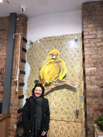Allison Luci mural artist yellow canary painting coffeeshop art cafe canary brooklyn williamsburg NYC artist