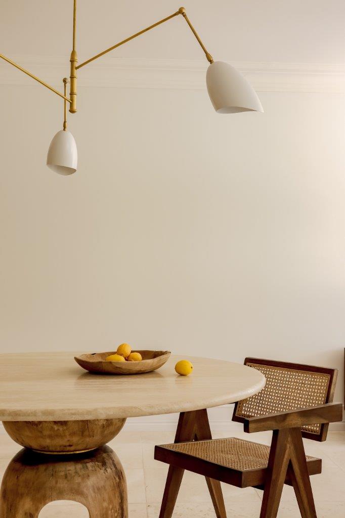 Lunar Table in Travertine with the Josef Chair