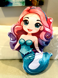 Retro girl mermaid has red and purple hair and a teal tail/shirt and top on - super cute