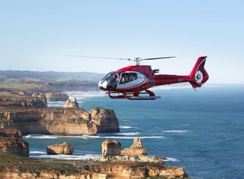 Helicopter in the air above the Twelve Apostles, Great Ocean Road, Victoria, Melbourne