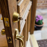 open door with key in lock