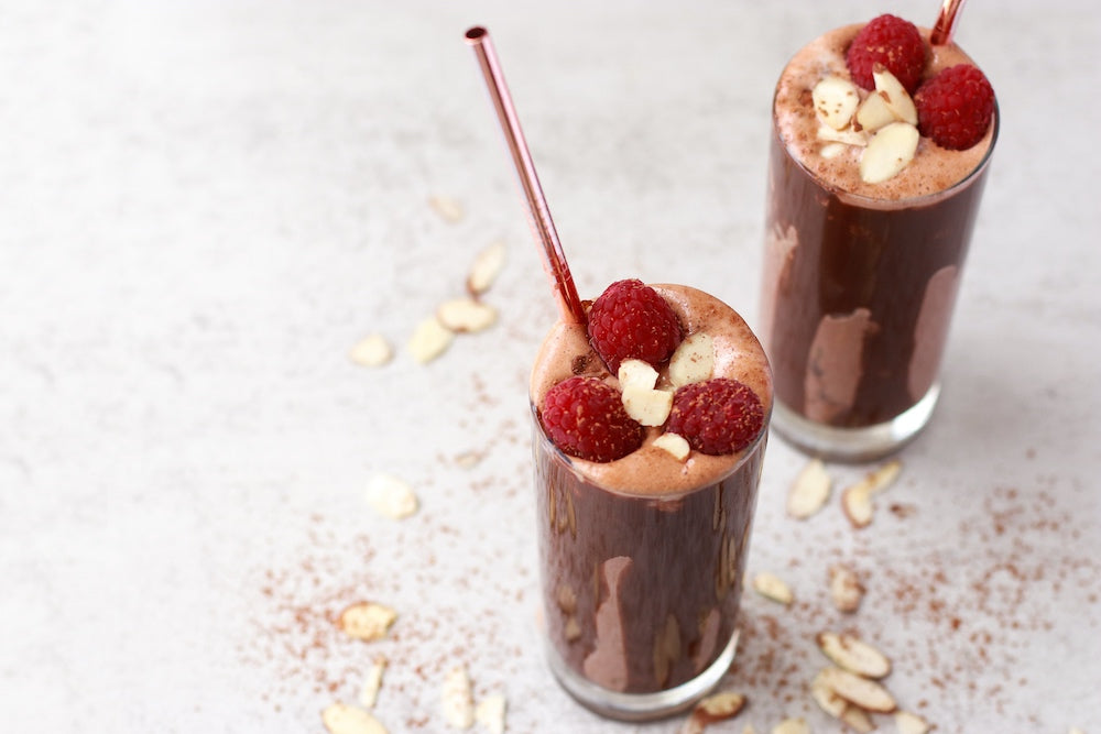 Two chocolate raspberry smoothies for healthy, high protein vegan snacks.