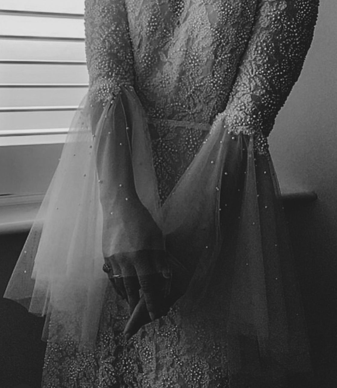 Modern wedding dress with couture sleeve detail