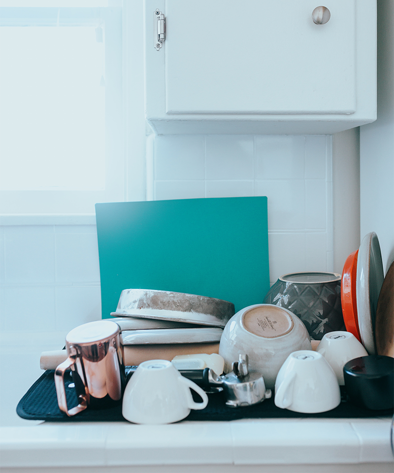 Pile of dishes and cup in a kitchen