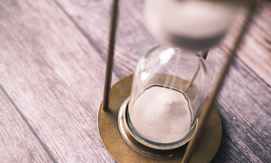 Hourglass on table