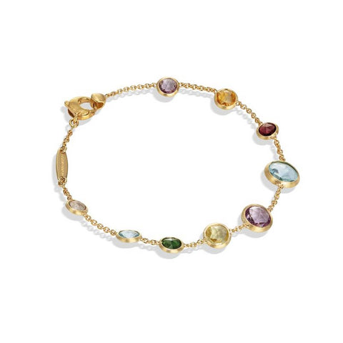 yellow gold bracelet with stationed gemstones 
