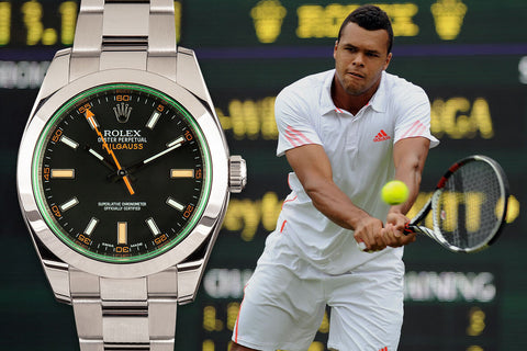 Jo-Wilfried Tsonga playing tennis at Wimbledon