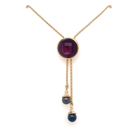 custom lariat necklace with pearls and deep red gemstone in gold 