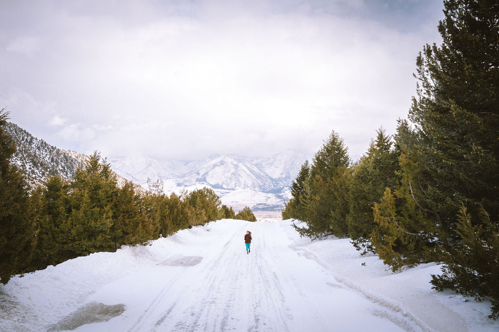 eavan running through snowy landscape